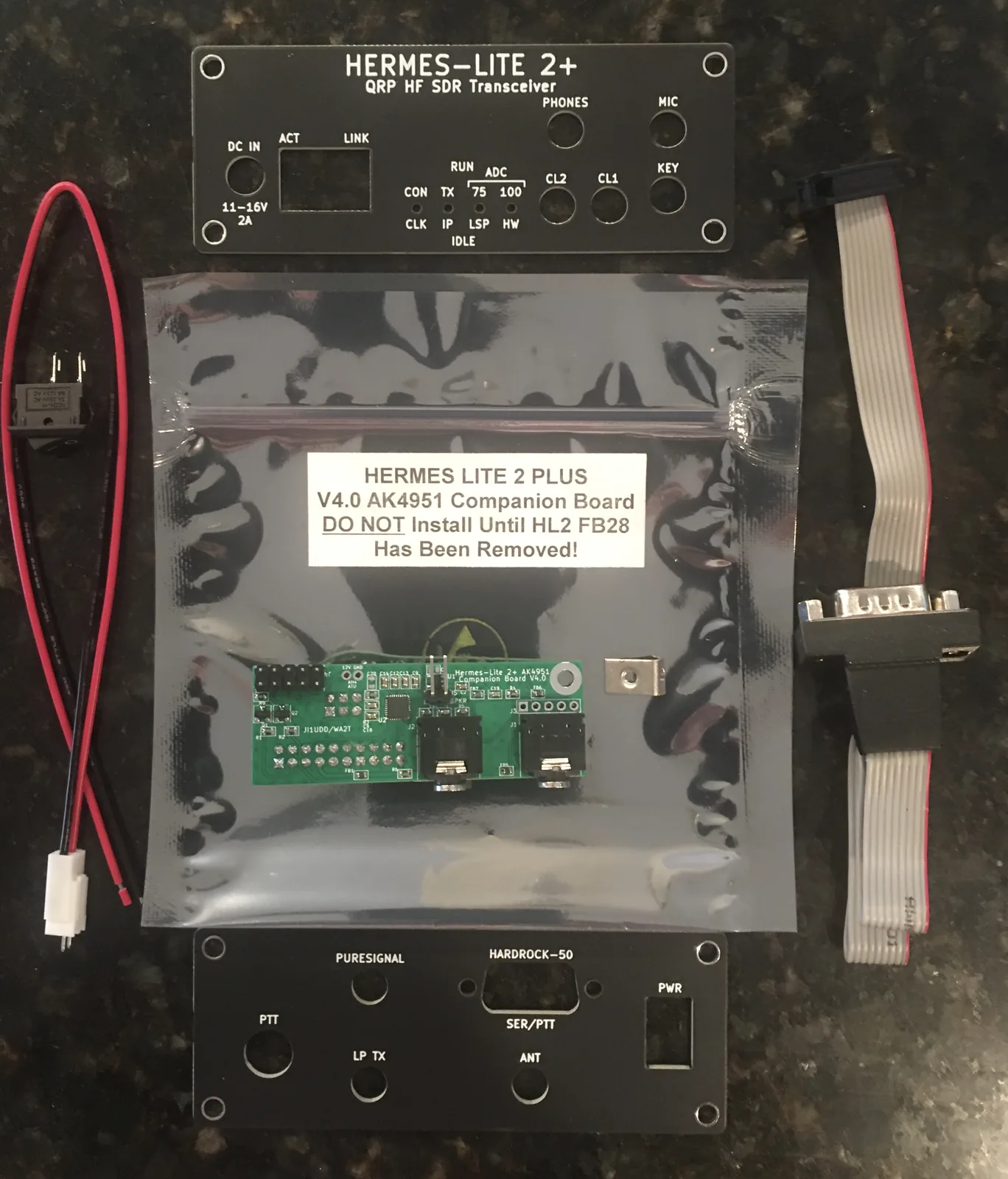 The contents of the AK4951 companion board kit laid out